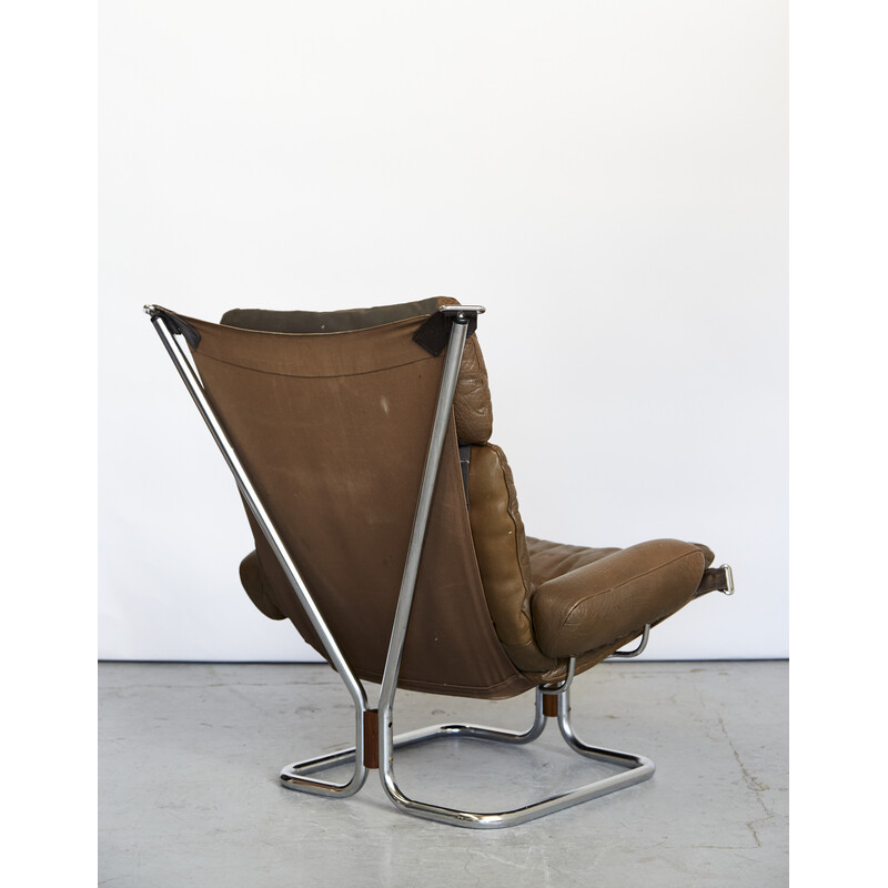 Vintage chrome steel and leather armchair and ottoman by Ingmar Relling for Westnofa, Norway 1970s