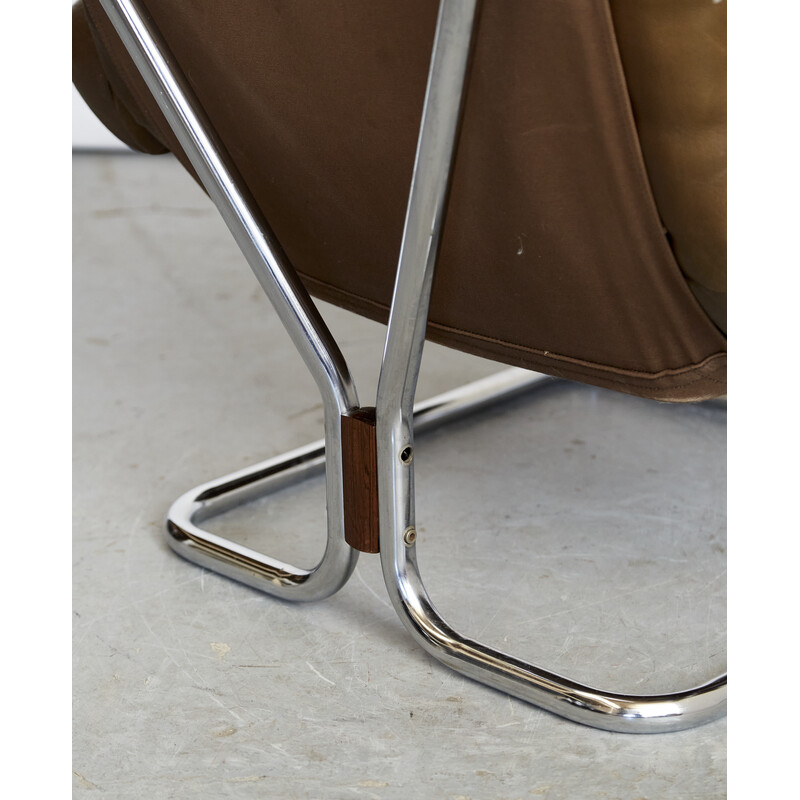 Vintage chrome steel and leather armchair and ottoman by Ingmar Relling for Westnofa, Norway 1970s