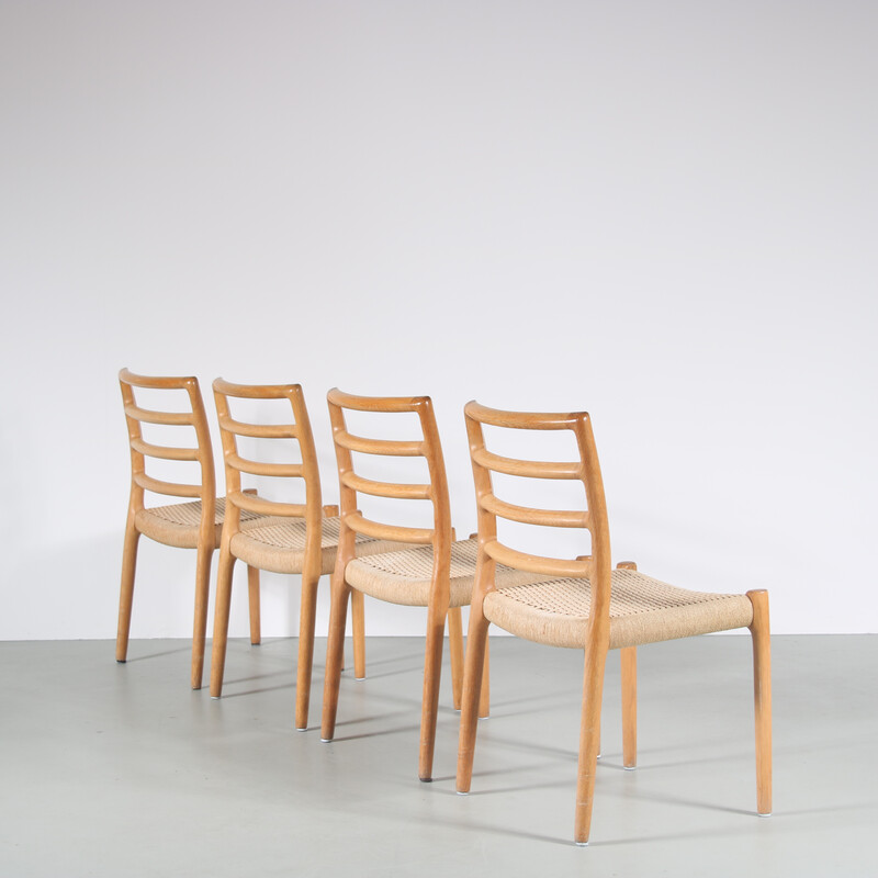 Set of 4 vintage dining chairs 85 in oakwood and papercord by Moller, Denmark 1970s