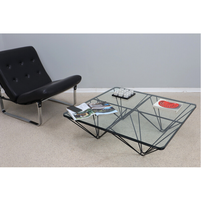 Vintage geometric coffee table in black lacquered tubular iron and transparent glass, Italy 1980s