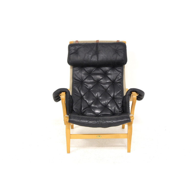 Vintage armchair "pernilla" in black leather and oak by Bruno Mathsson for Karl Mathsson, Sweden 1960s