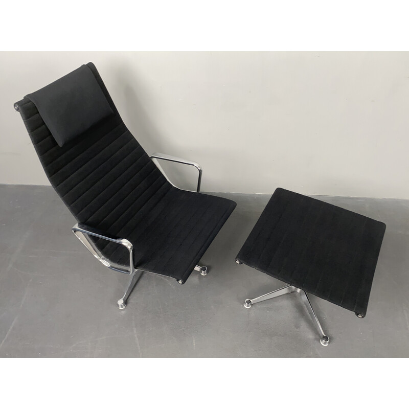 Poltrona vintage Ea 124 con poggiapiedi di Charles e Ray Eames per Herman Miller, Germania anni '70