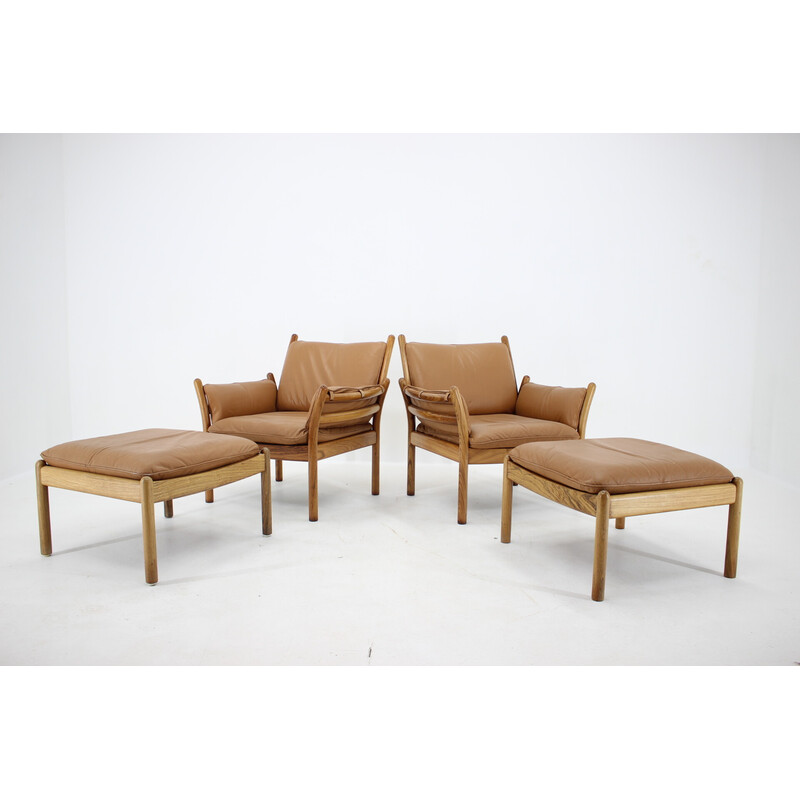 Pair of vintage Genius armchairs with ottoman in rosewood leather by Illum Wikkelsø for Cfc Silkeborg, Denmark 1960s