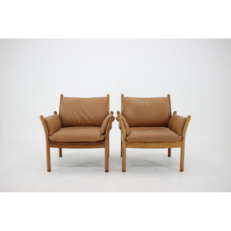 Pair of vintage Genius armchairs with ottoman in rosewood leather by Illum Wikkelsø for Cfc Silkeborg, Denmark 1960s