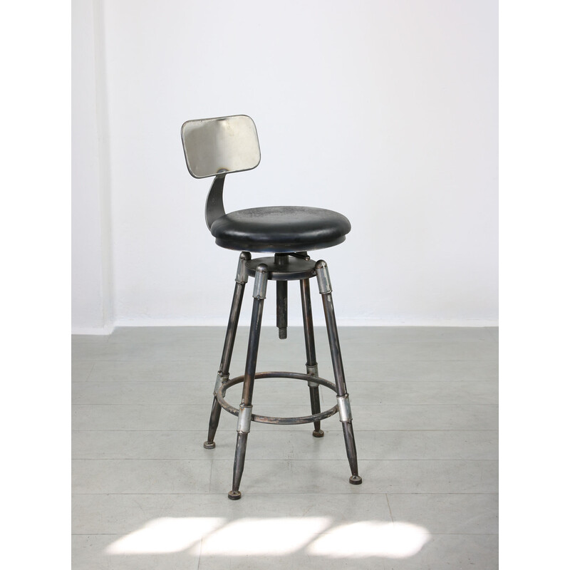 Vintage industrial metal and leather swivel bar stool