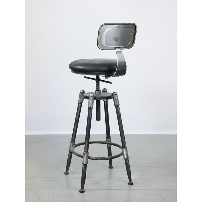 Vintage industrial metal and leather swivel bar stool