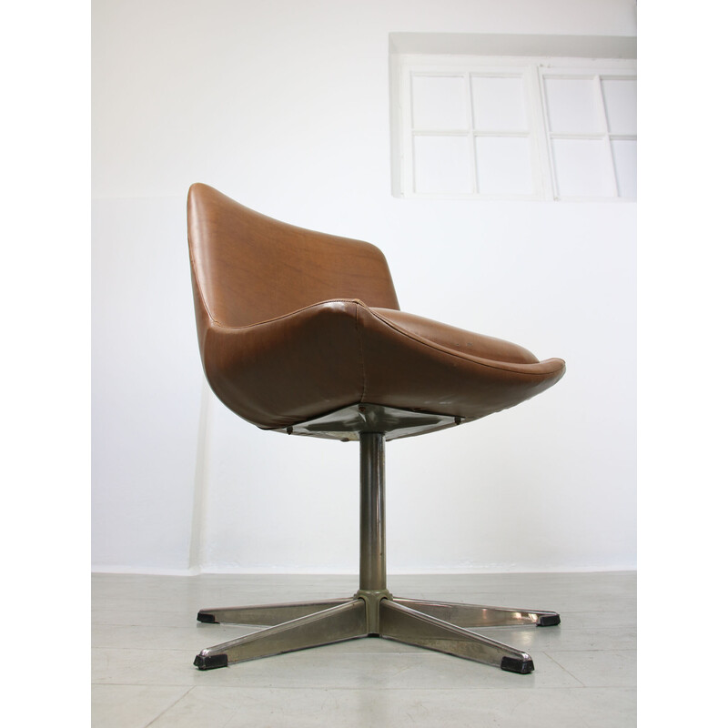 Mid-century brown leatherette swivel armchair by Stol