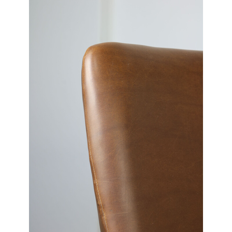 Mid-century brown leatherette swivel armchair by Stol