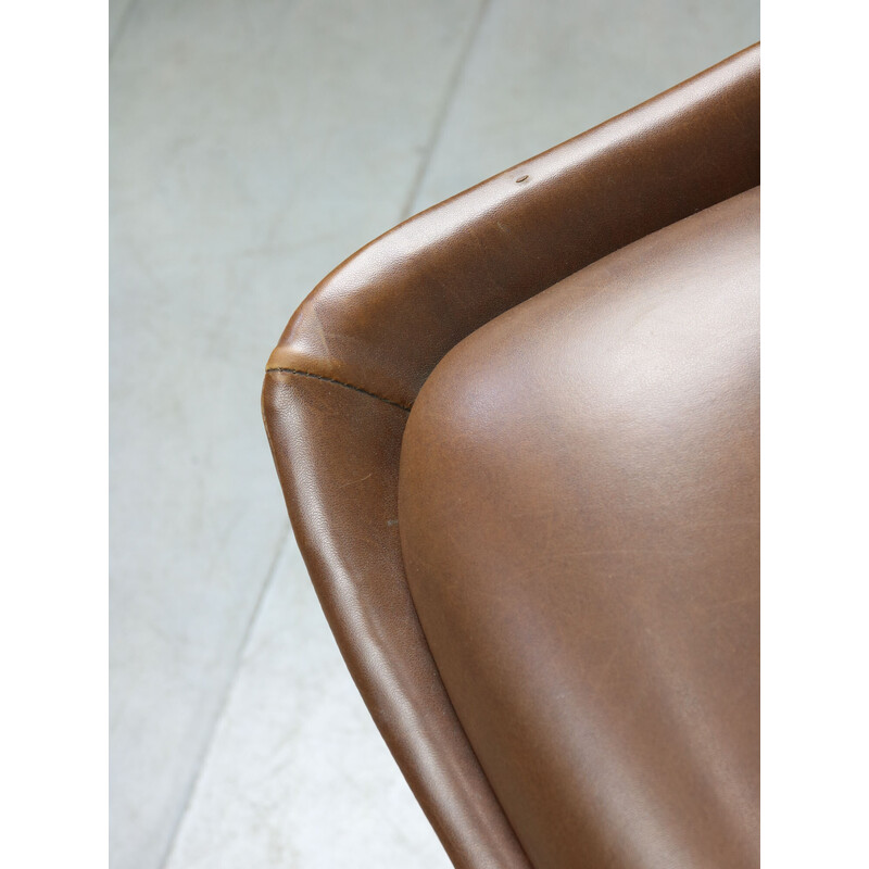 Mid-century brown leatherette swivel armchair by Stol