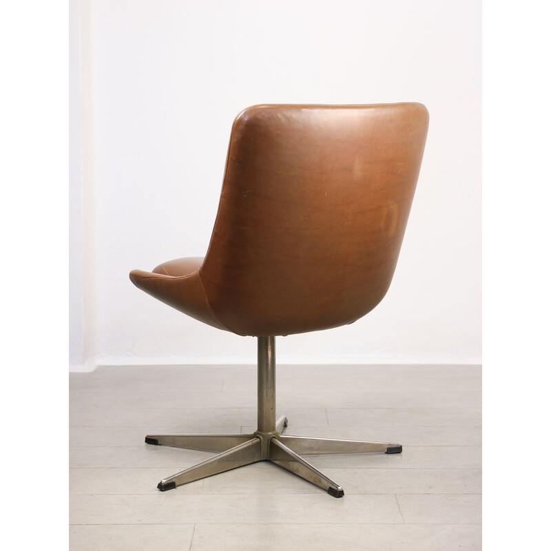 Mid-century brown leatherette swivel armchair by Stol