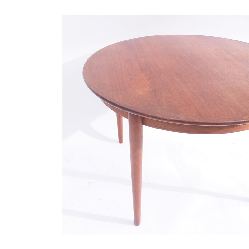 Vintage teak round table by Johannes Andersen, Denmark 1960s