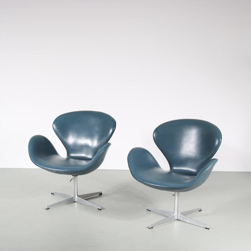Pair of vintage metal and skai "Swan" armchairs by Arne Jacobsen for Fritz Hansen, Denmark 1960s
