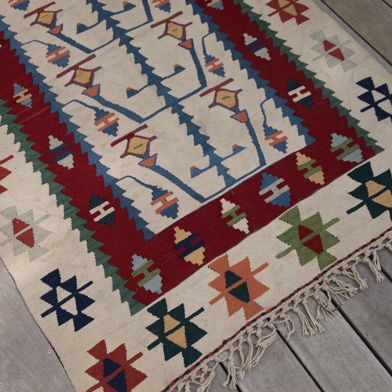 Vintage Kilim rug in polychrome wool