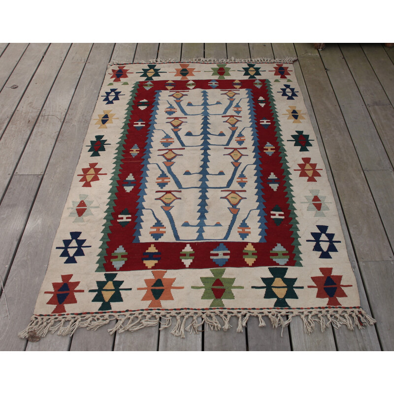 Vintage Kilim rug in polychrome wool