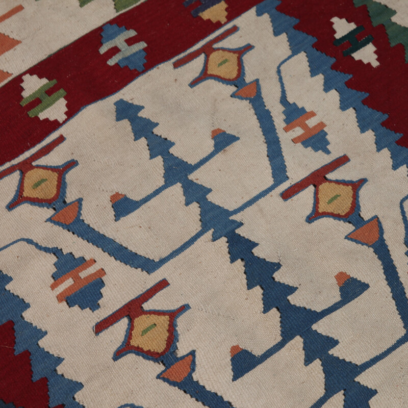 Vintage Kilim rug in polychrome wool