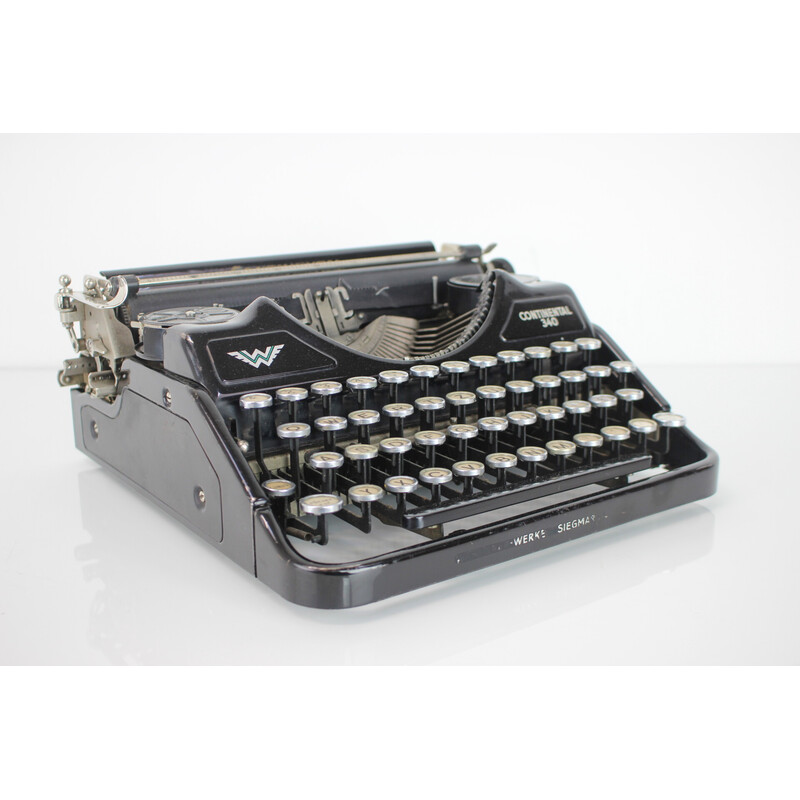 Máquina de escribir portátil vintage de metal, acero y cromo, Alemania años 1931-1940