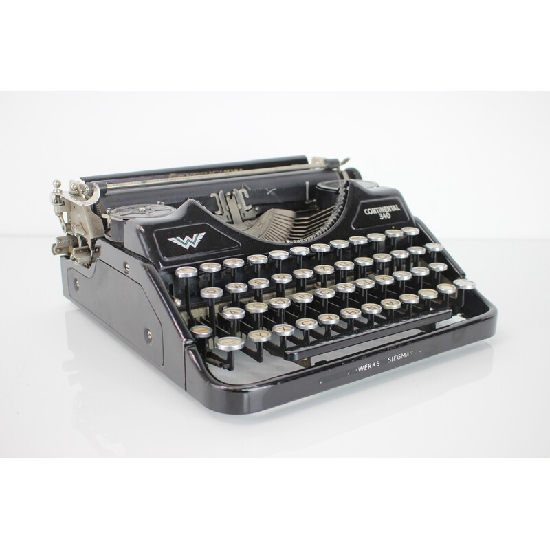 Máquina de escribir portátil vintage de metal, acero y cromo, Alemania años 1931-1940