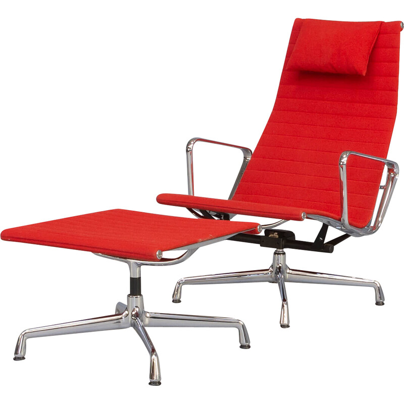 Vintage fauteuil en voetenbank van Charles en Ray Eames voor Vitra