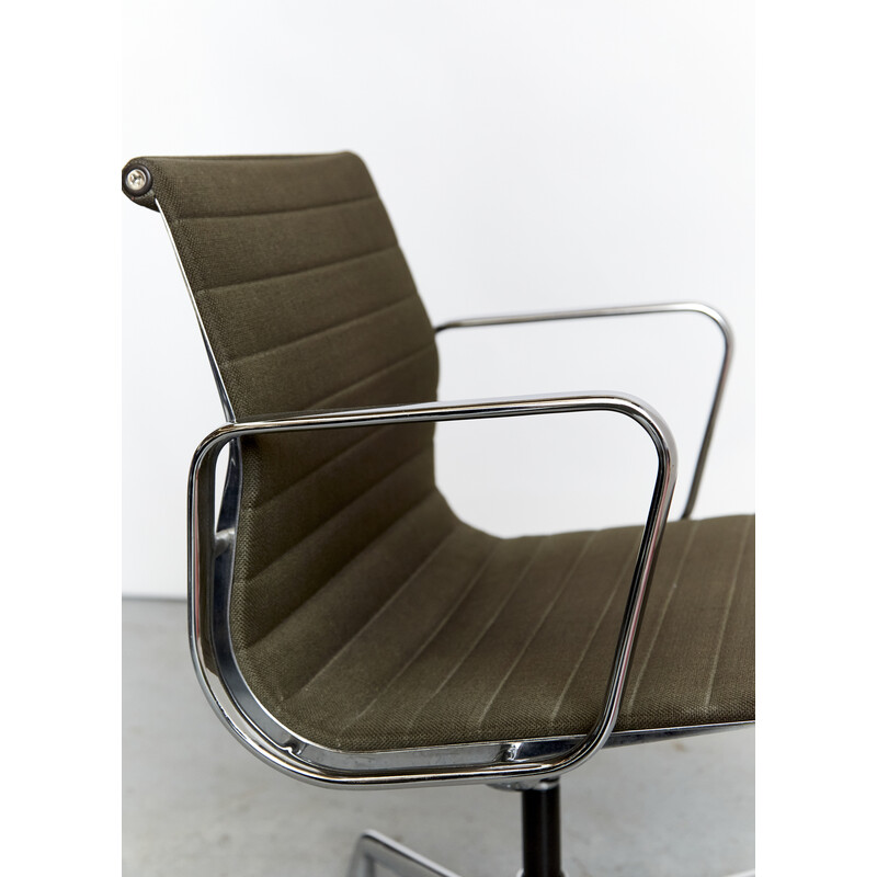 Vintage Ea 108 swivel armchair by Charles and Ray Eames for Vitra