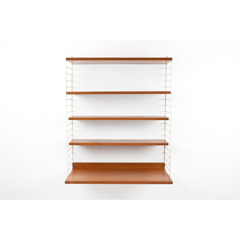 Modular wall system in teak and metal with several shelves by Nils Strinning for AB String - 1950s