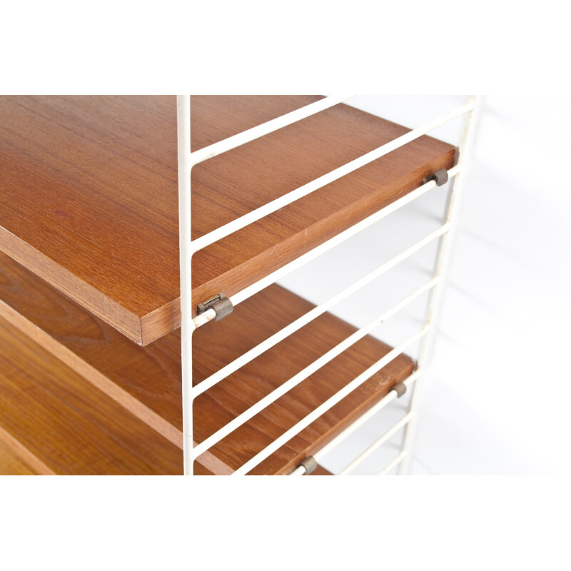 Modular wall system in teak and metal with several shelves by Nils Strinning for AB String - 1950s