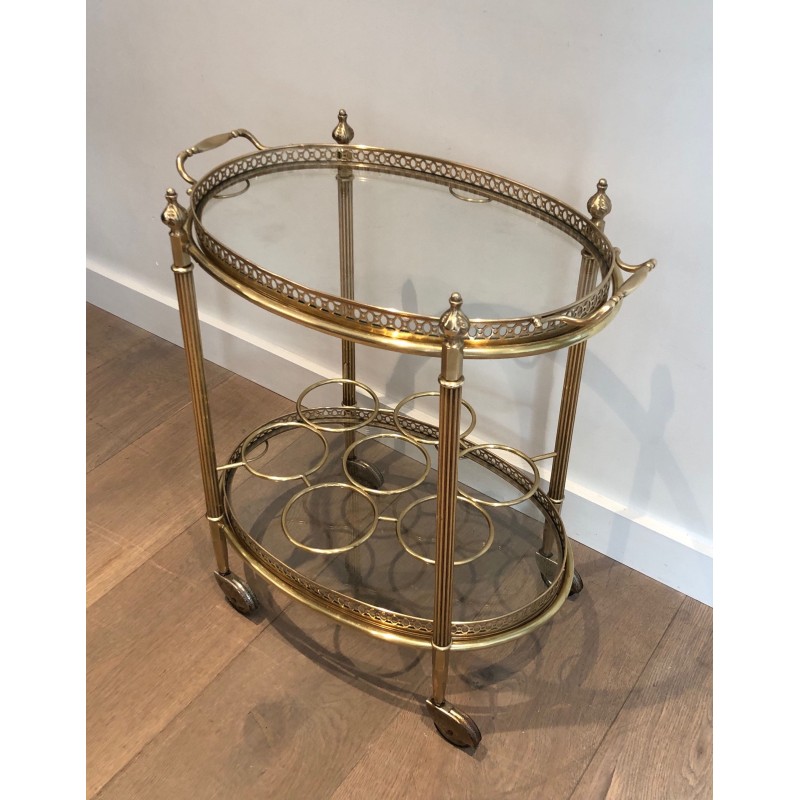 Vintage oval brass serving table on wheels by Jansen, 1940