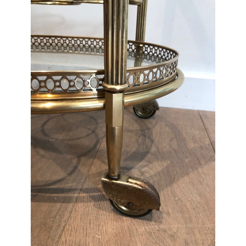 Vintage oval brass serving table on wheels by Jansen, 1940