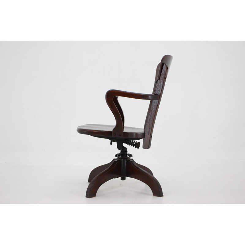 Vintage wooden swivel and reclining office chair, Usa 1930s