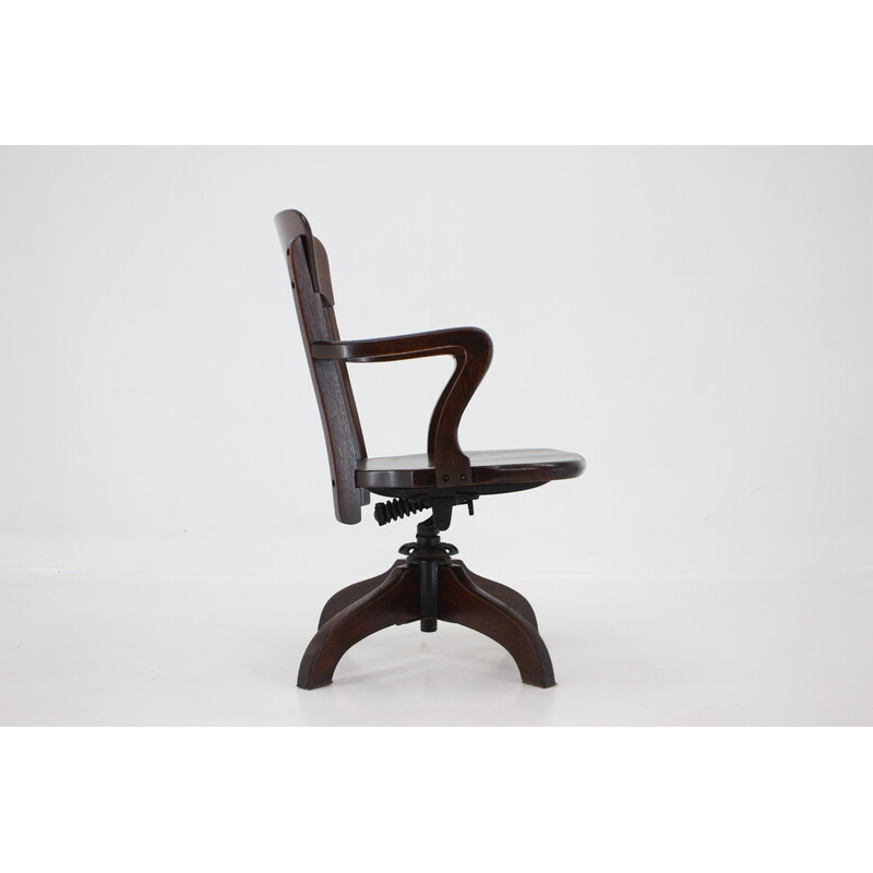 Vintage wooden swivel and reclining office chair, Usa 1930s