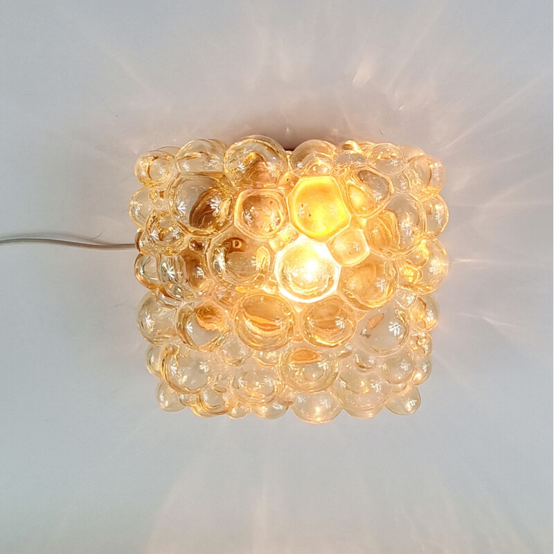 Vintage wall lamp in amber bubble glass and brass by Helena Tynell for Limburg, Germany 1970s