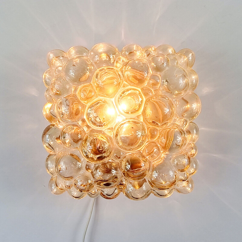 Vintage wall lamp in amber bubble glass and brass by Helena Tynell for Limburg, Germany 1970s