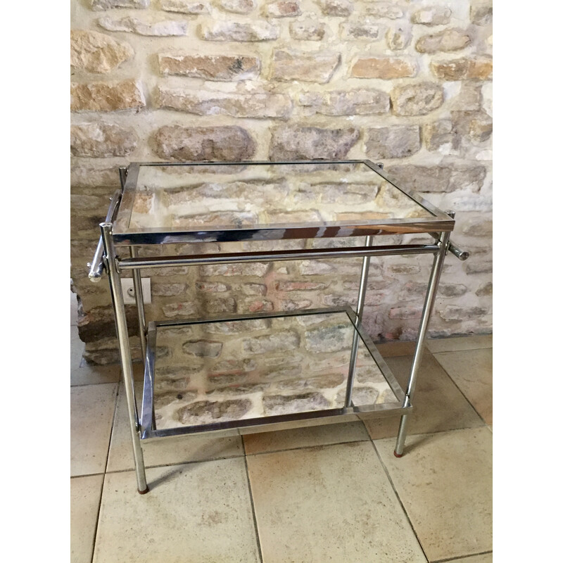 Vintage serving table in nickel-plated chrome and rubber by Jacques Adnet
