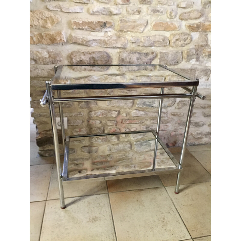 Vintage serving table in nickel-plated chrome and rubber by Jacques Adnet