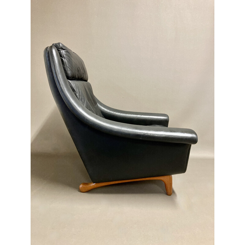 Scandinavian vintage armchair in leather and teak by Aage Christiansen, 1950