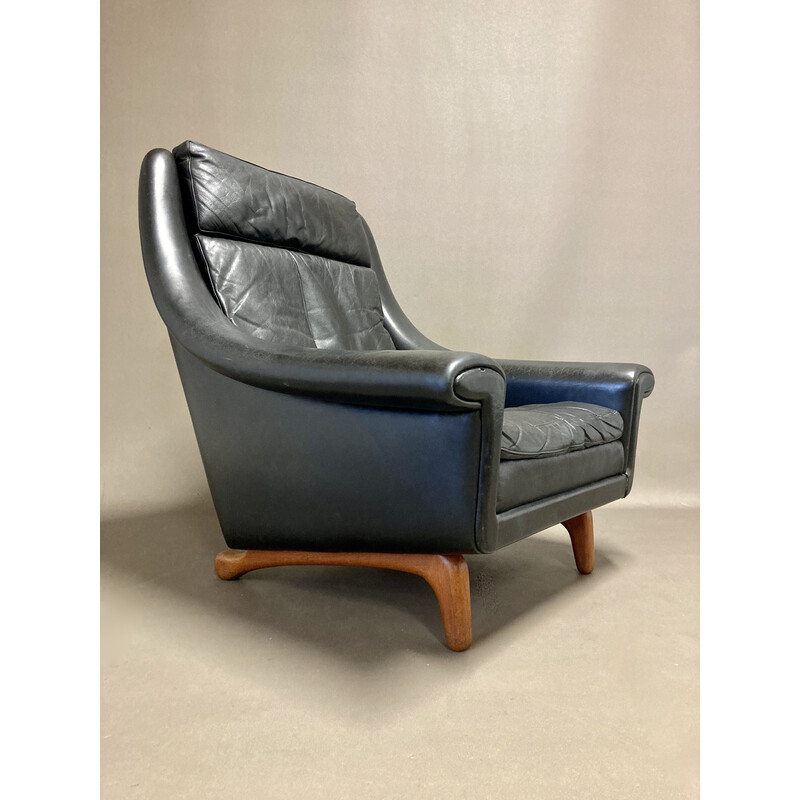 Scandinavian vintage armchair in leather and teak by Aage Christiansen, 1950