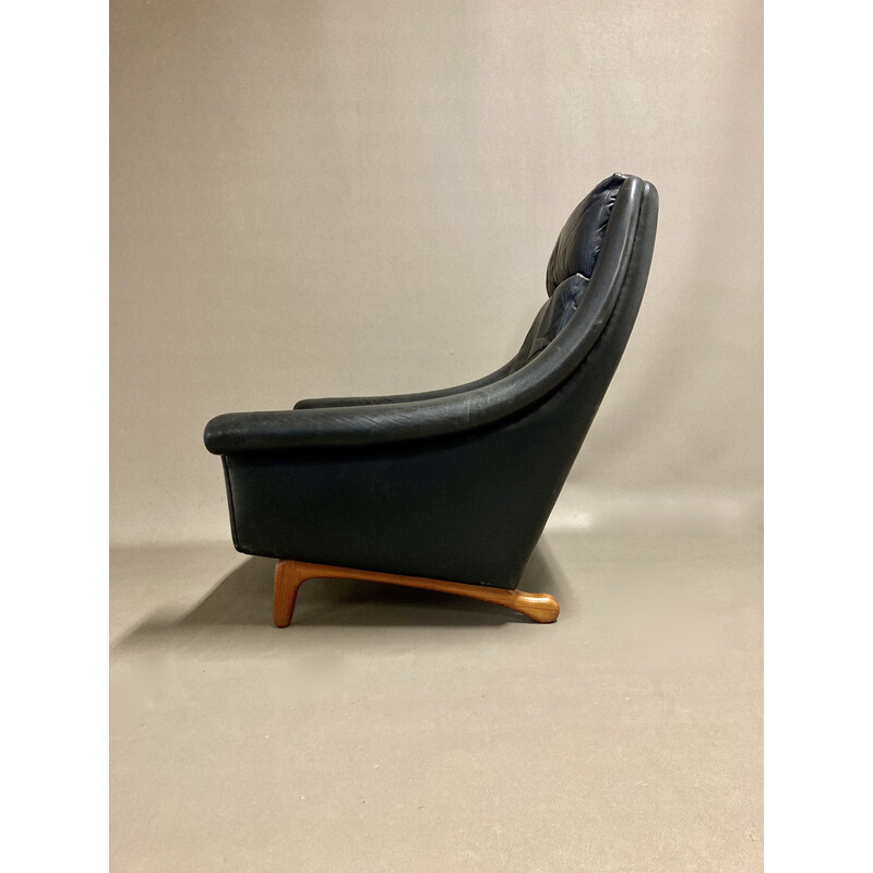 Scandinavian vintage armchair in leather and teak by Aage Christiansen, 1950