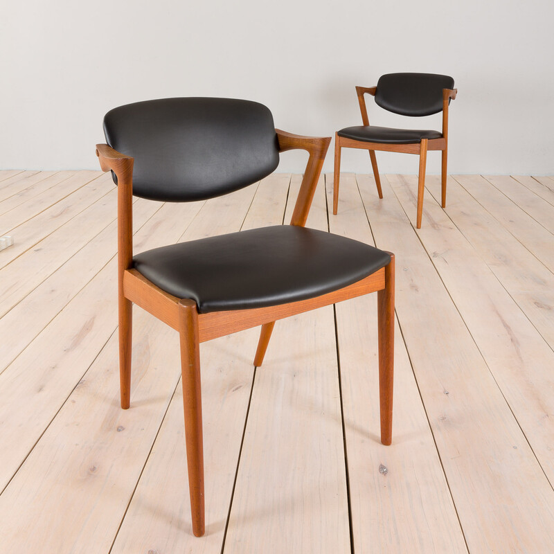 Pair of vintage chairs model 42 in teak and black leather by Kai Kristiansen for Schou Andersen, 1960s