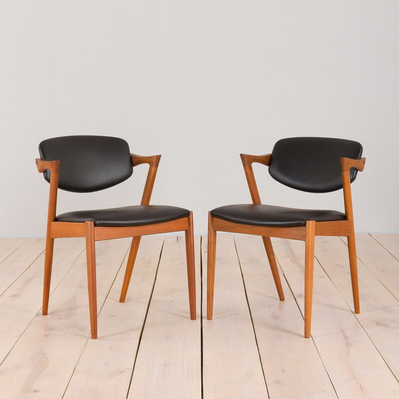 Pair of vintage chairs model 42 in teak and black leather by Kai Kristiansen for Schou Andersen, 1960s