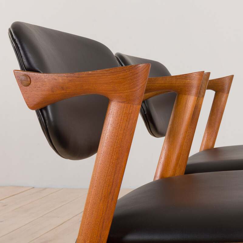 Pair of vintage chairs model 42 in teak and black leather by Kai Kristiansen for Schou Andersen, 1960s