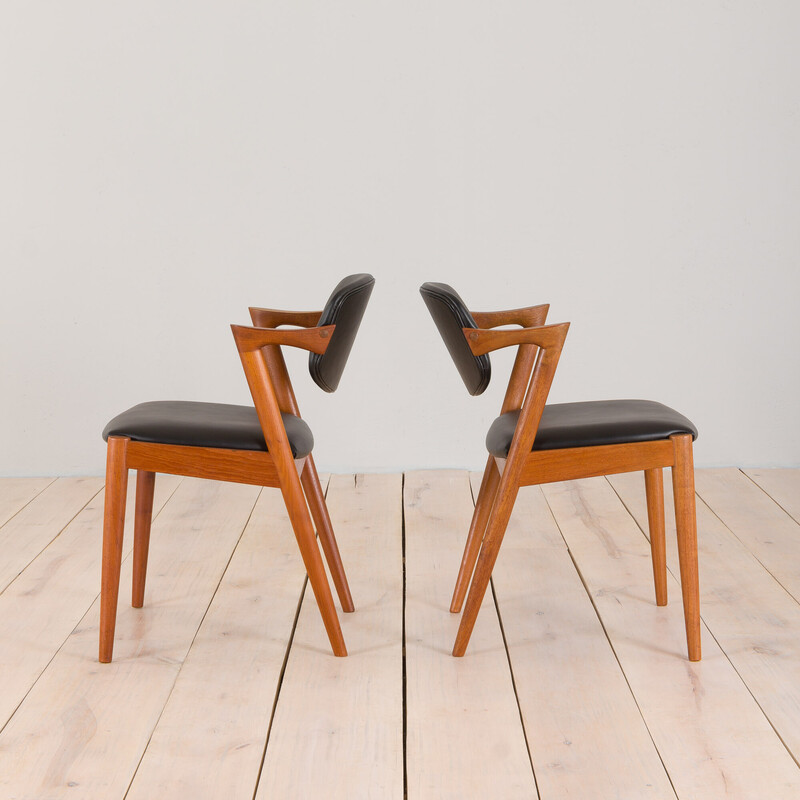 Pair of vintage chairs model 42 in teak and black leather by Kai Kristiansen for Schou Andersen, 1960s