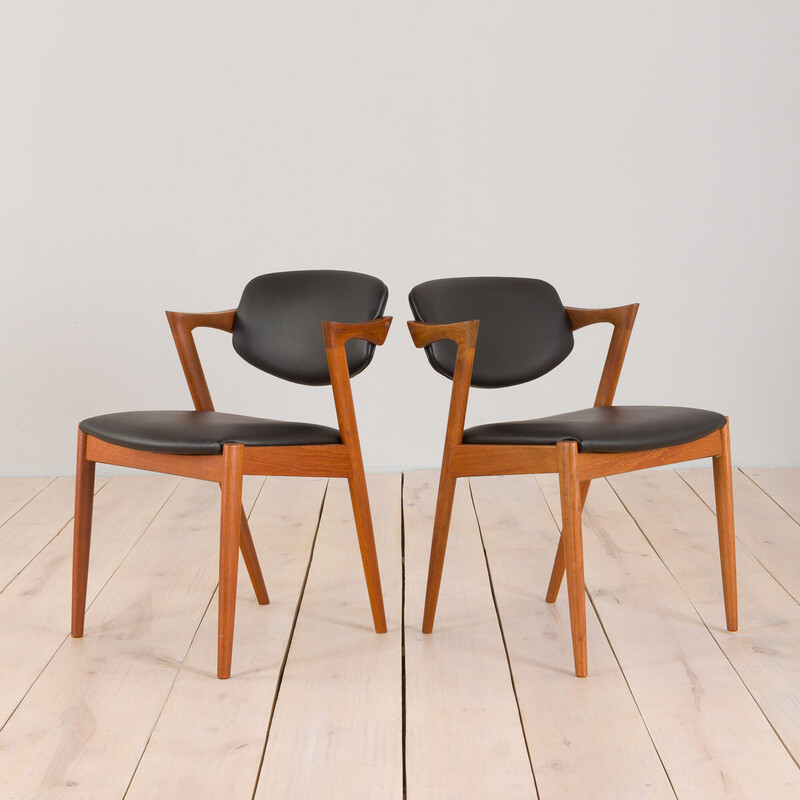 Pair of vintage chairs model 42 in teak and black leather by Kai Kristiansen for Schou Andersen, 1960s