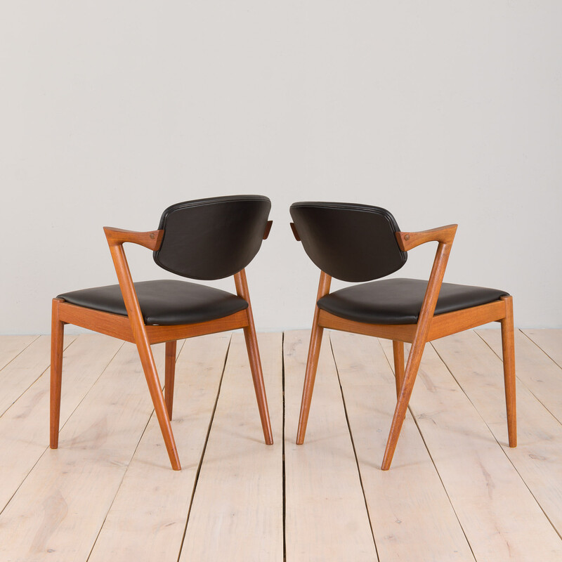 Pair of vintage chairs model 42 in teak and black leather by Kai Kristiansen for Schou Andersen, 1960s