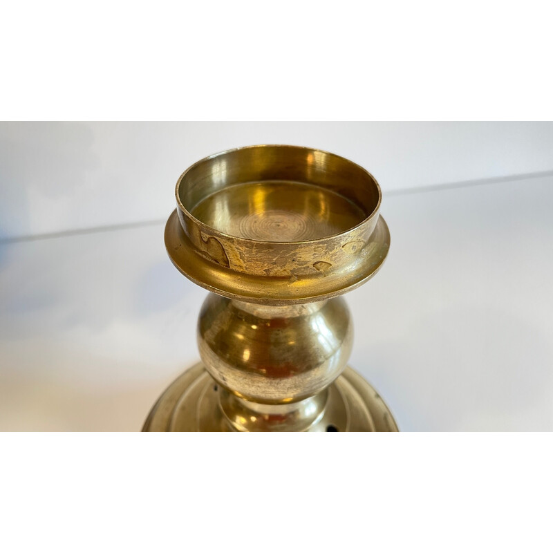 Vintage candlestick in solid brass