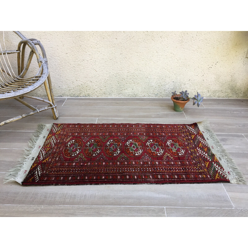 Vintage Afghan rug in red-orange wool