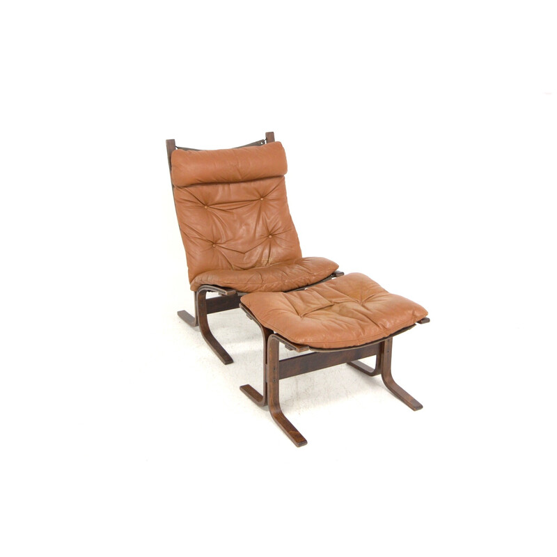 Vintage Siesta leather armchair with ottoman by Ingmar Relling, Norway 1960