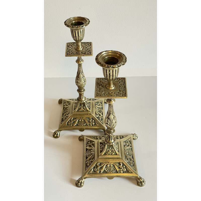 Pair of vintage lion pate candlesticks in solid brass