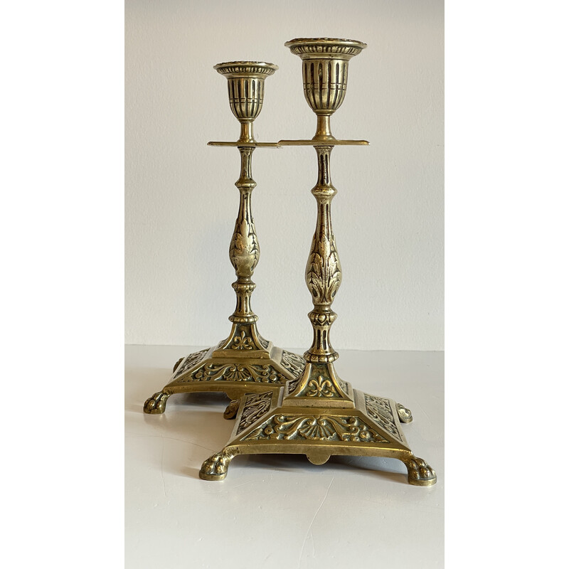 Pair of vintage lion pate candlesticks in solid brass