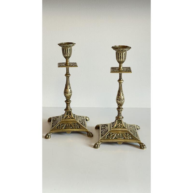 Pair of vintage lion pate candlesticks in solid brass