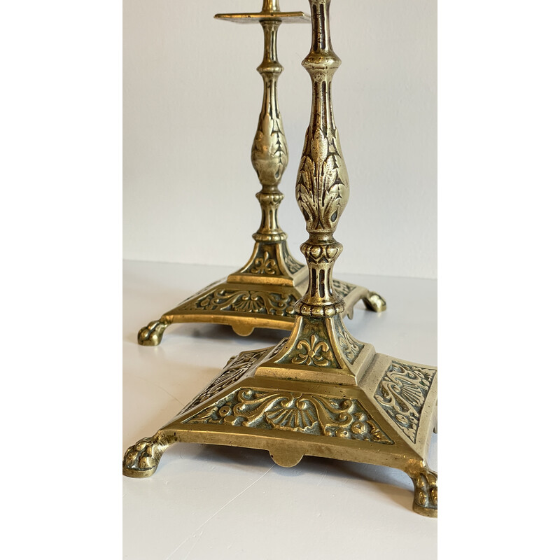 Pair of vintage lion pate candlesticks in solid brass