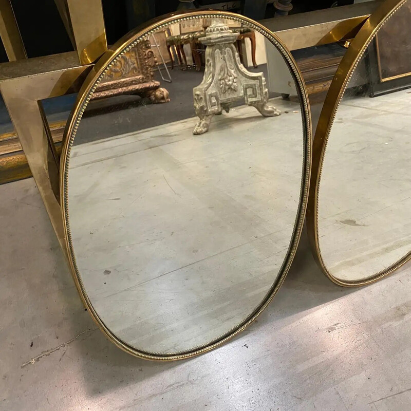 Pair of vintage brass oval mirrors, Italy 1960s